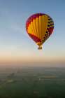 Africa, Egypt, Luxor. Hot air balloons travel over the Valley of the Kings at sunrise. Art Print